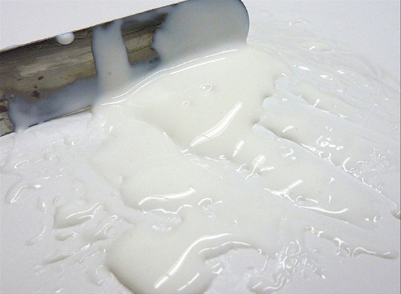 Thick Self Leveling Gel agitated with a palette knife, relaxes after several minutes, losing all tool marks.