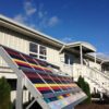 GOLDEN Begins Extensive On-Site Exterior Mural Testing One of three new test fences recently erected on the south facing lawn at GOLDEN Artist Colors, Inc. in New Berlin, New York.